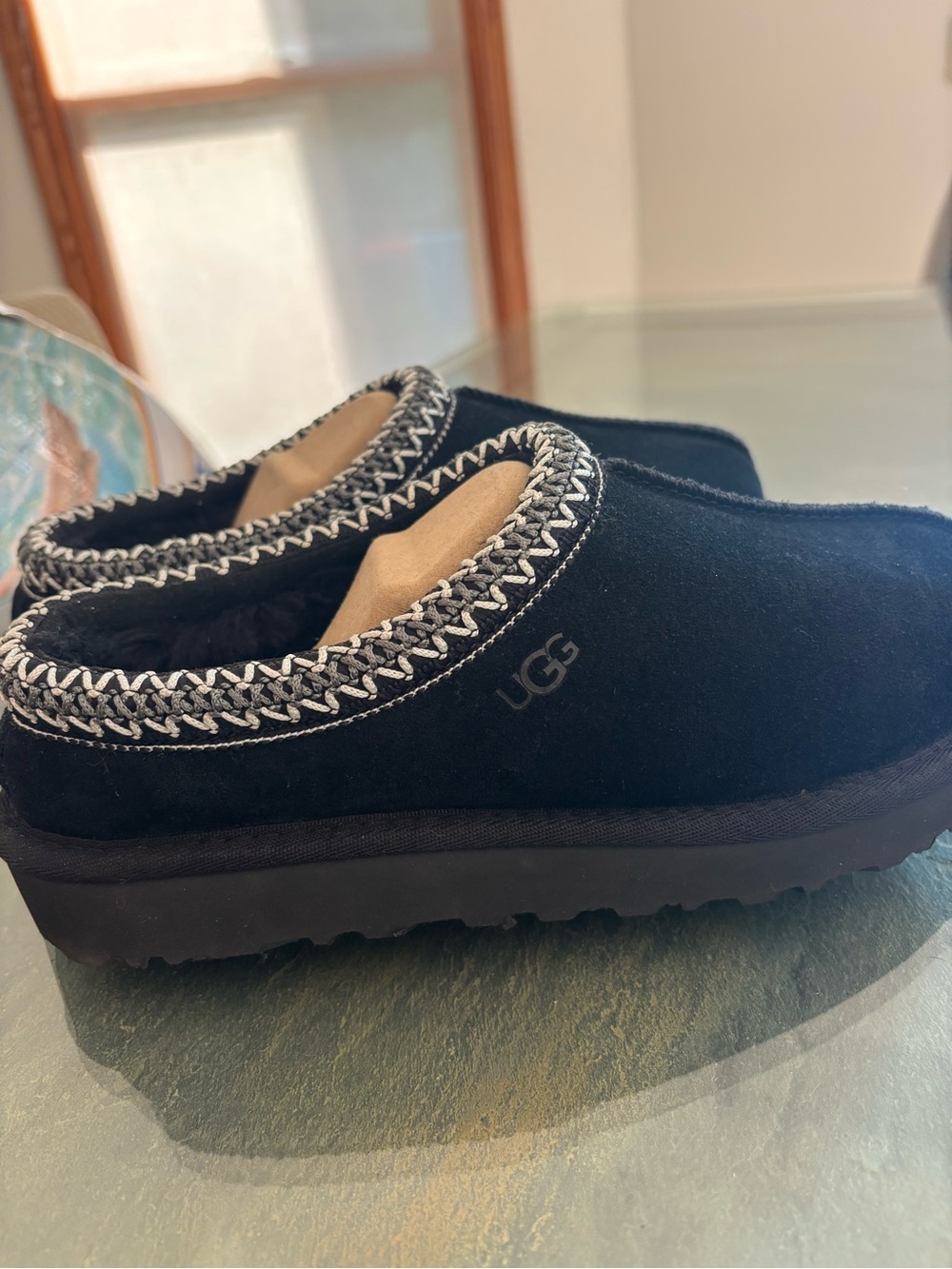 UGG Black Suede Cozy Slip-On Clogs with Woven Trim. New without box. Size 6